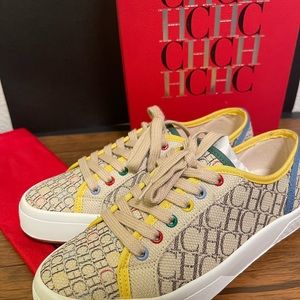 New canvas Carolina Herrera sneakers. Never worn. Given as a gift.